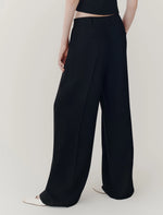 Load image into Gallery viewer, black relaxed-fit envers satin trousers
