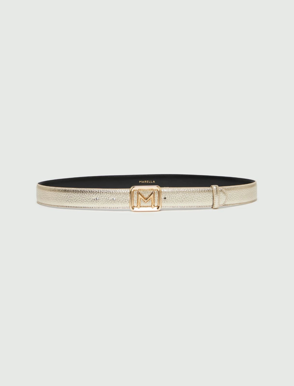 Golden M buckle-adorned belt