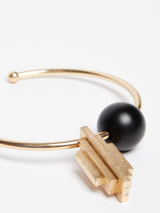 gold dune necklace in metal and wood
