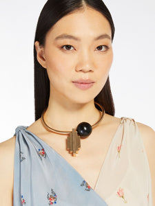 gold dune necklace in metal and wood