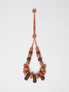 rust long straw necklace