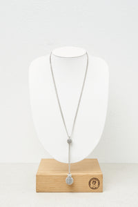 grey long necklace