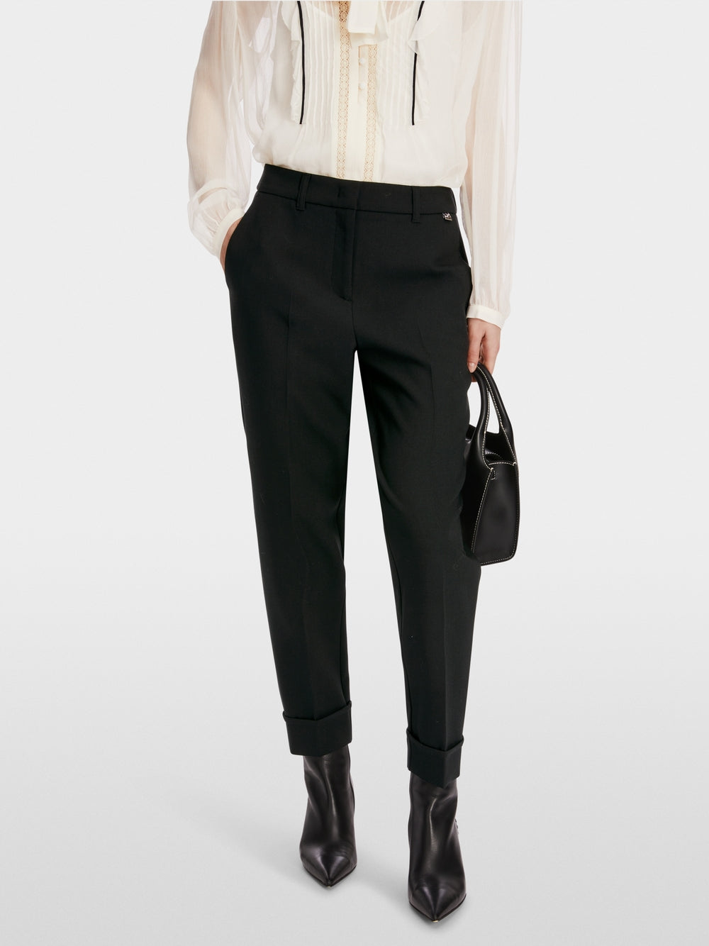 black FUSHUN trousers with crease