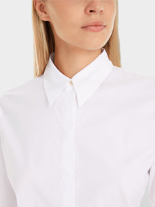 white blouse with pleat details