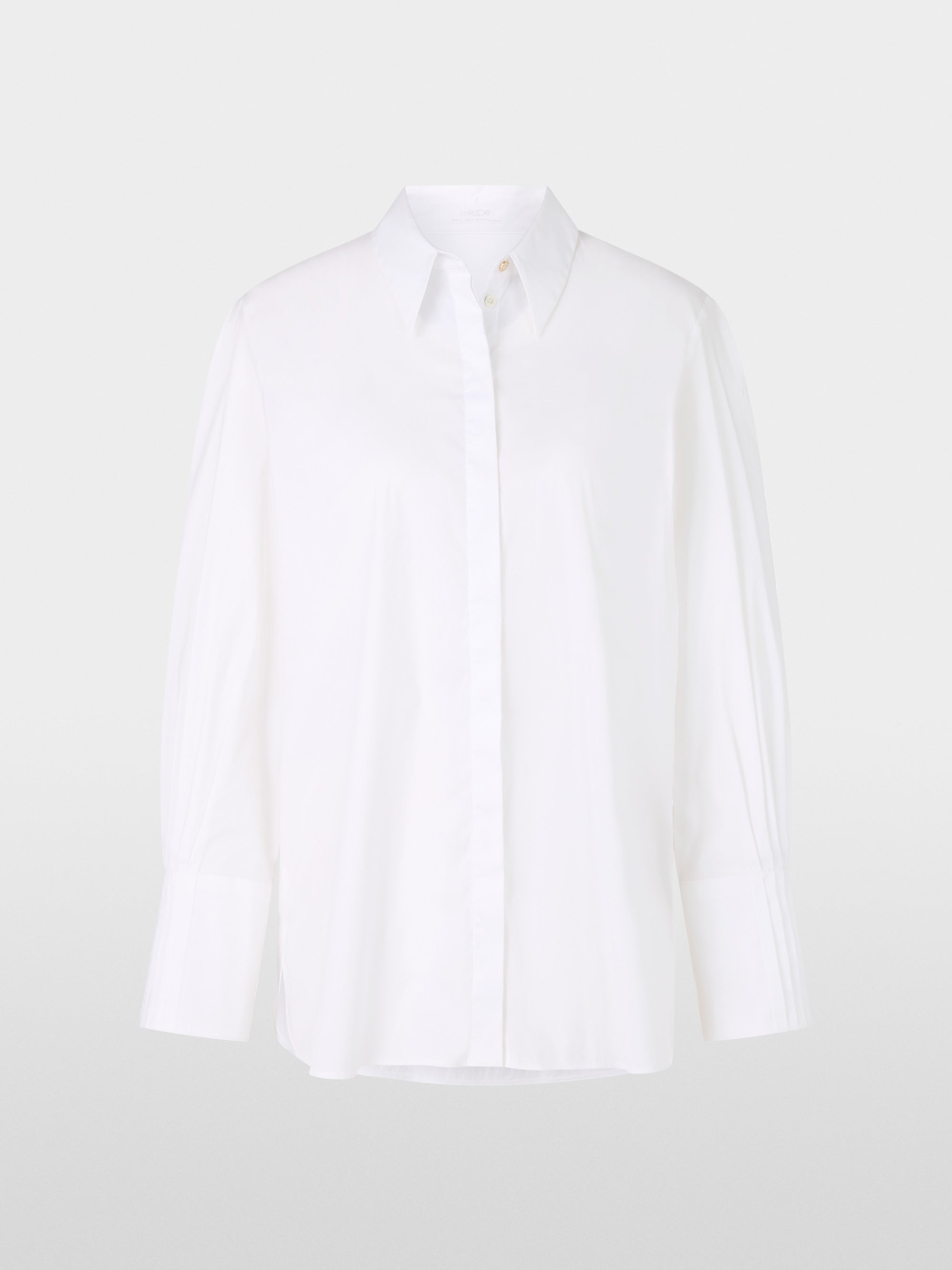 white blouse with pleat details